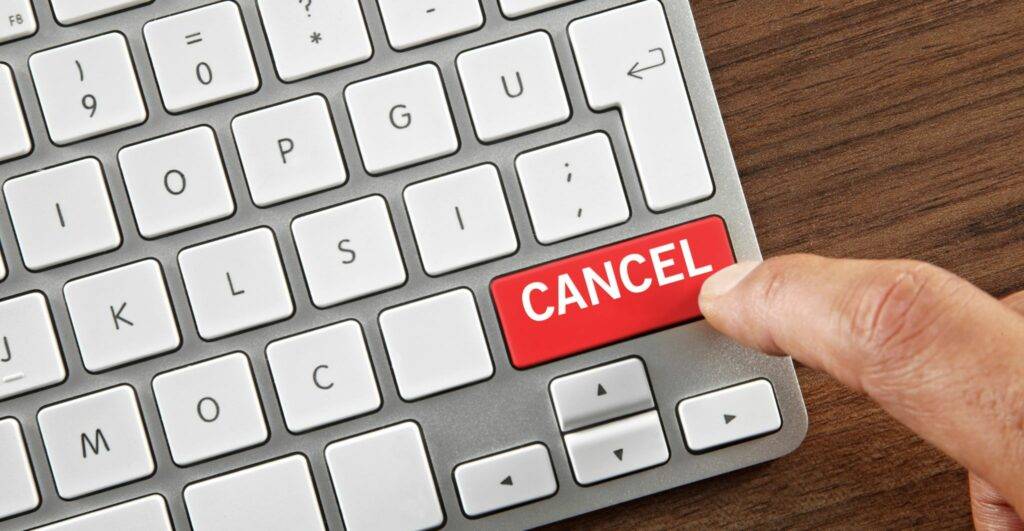 Keyboard with cancel key symbolising UK Sponsor Licence Revocation